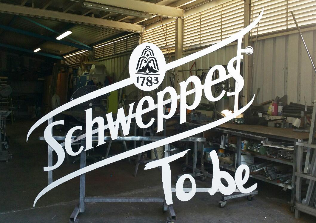 Enseigne Schweppes